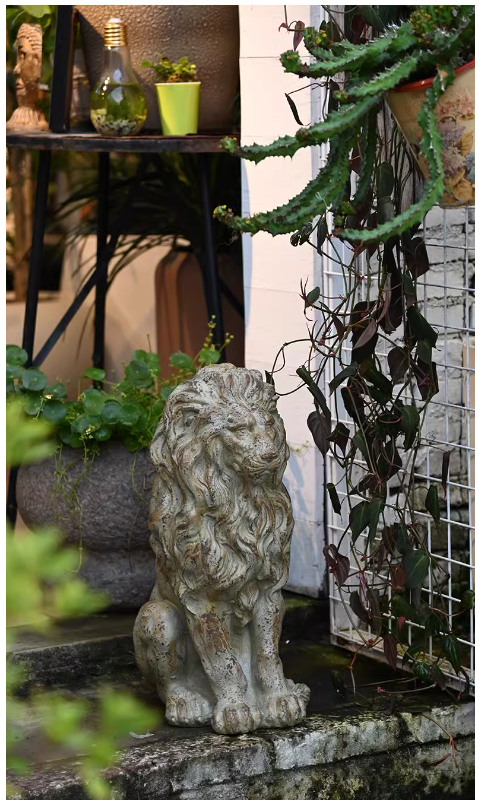 A large lion sculpture for the garden, evoking a sense of European vintage garden artistry.