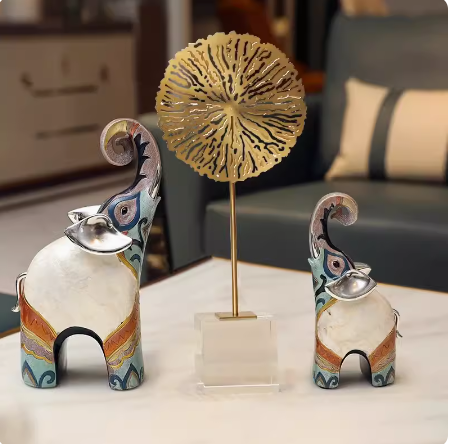 An opulent yet modern European-style piece, this decorative elephant brings an air of luxury to any space, whether it's placed in the living room, beside a drinks cabinet, or in the foyer. Its presence adds an artistic touch to the surrounding