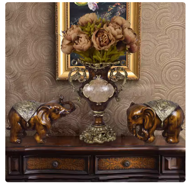 Combining classical Chinese, American luxury, and European styles, this set of three decorative elephant vases brings a touch of traditional elegance to any home. It's perfect for adding a touch of prosperity and charm to your living space.