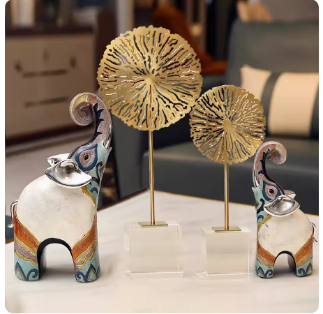 An opulent yet modern European-style piece, this decorative elephant brings an air of luxury to any space, whether it's placed in the living room, beside a drinks cabinet, or in the foyer. Its presence adds an artistic touch to the surrounding