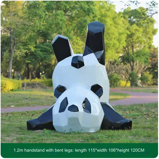 Fiberglass painted panda sculpture, outdoor lawn decoration with geometric animal design.