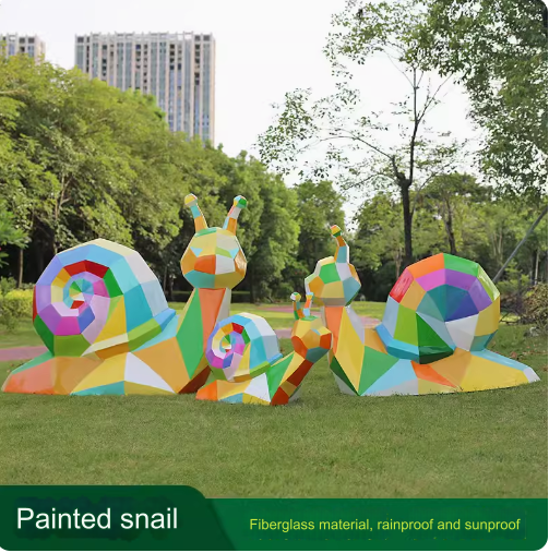 Colorful geometric snail sculpture, crafted from fiberglass, perfect for outdoor lawn decoration and landscaping.