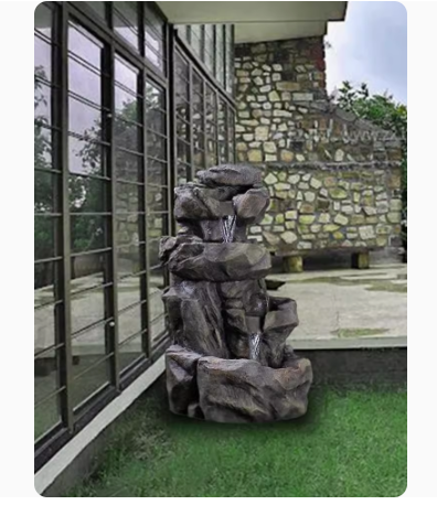 A faux stone rockery fountain with flowing water, symbolizing prosperity, suitable for outdoor garden, courtyard, balcony landscape decoration with a circulating water pool.