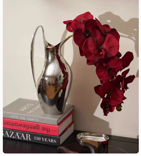 Crafted in the Nordic style, these stainless steel vases serve as exquisite home decor pieces, exuding an aura of luxury. Perfect as a sophisticated gift, they radiate a sense of refinement and elegance.