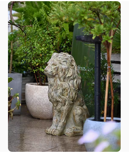 A large lion sculpture for the garden, evoking a sense of European vintage garden artistry.