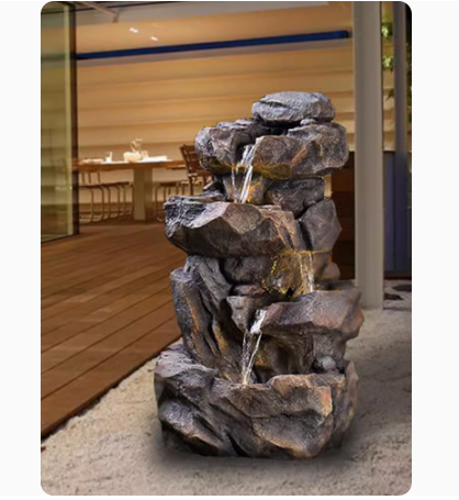 A faux stone rockery fountain with flowing water, symbolizing prosperity, suitable for outdoor garden, courtyard, balcony landscape decoration with a circulating water pool.