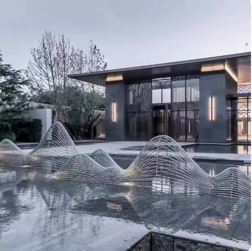 A large stainless steel abstract rockery sculpture fountain, ideal for upscale villa water landscape decoration.