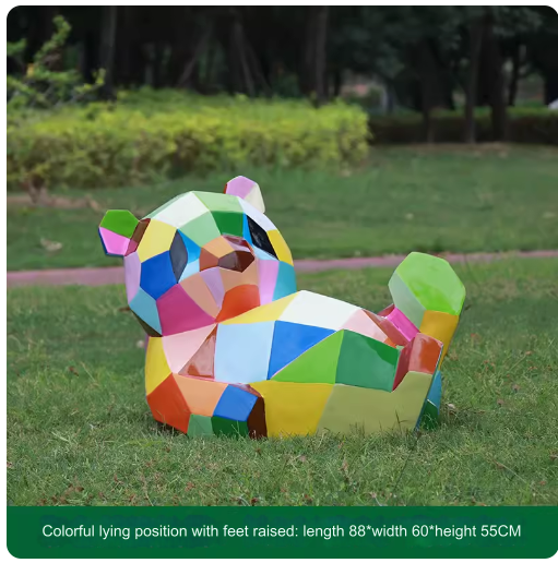 Fiberglass painted panda sculpture, outdoor lawn decoration with geometric animal design.