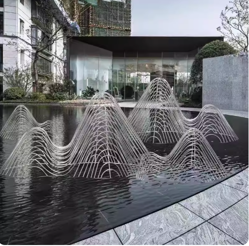 A large stainless steel abstract rockery sculpture fountain, ideal for upscale villa water landscape decoration.