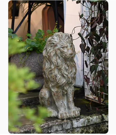 A large lion sculpture for the garden, evoking a sense of European vintage garden artistry.