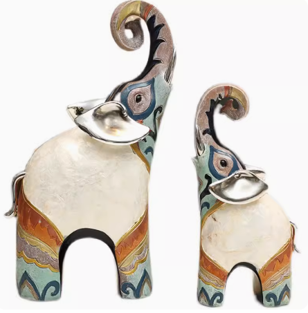 An opulent yet modern European-style piece, this decorative elephant brings an air of luxury to any space, whether it's placed in the living room, beside a drinks cabinet, or in the foyer. Its presence adds an artistic touch to the surrounding