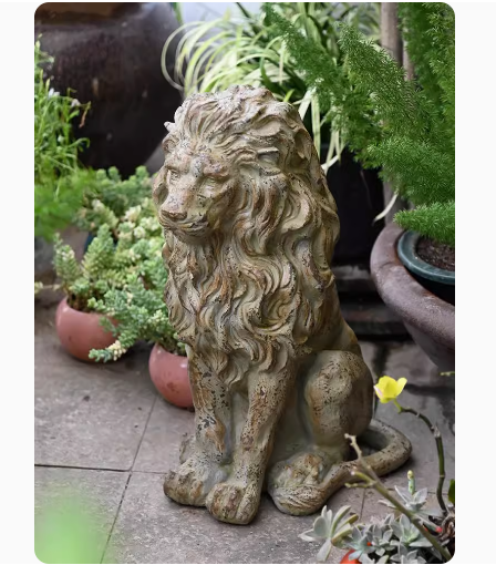 A large lion sculpture for the garden, evoking a sense of European vintage garden artistry.