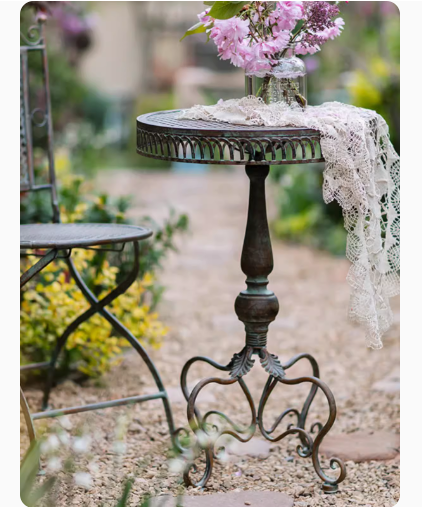 European Retro Iron Courtyard Table and Chairs, crafted from wrought iron, ideal for a cozy garden or terrace. This set is perfect for leisure and relaxation, creating a charming outdoor ambiance.