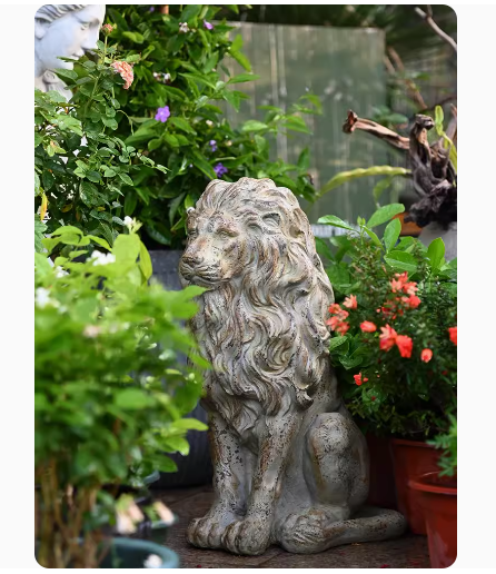 A large lion sculpture for the garden, evoking a sense of European vintage garden artistry.