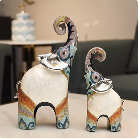 An opulent yet modern European-style piece, this decorative elephant brings an air of luxury to any space, whether it's placed in the living room, beside a drinks cabinet, or in the foyer. Its presence adds an artistic touch to the surrounding