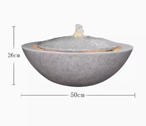 Garden water fountain feature, modern and simple home decoration, brings wealth and prosperity, crafted from decorative stones, resembling a treasure basin.