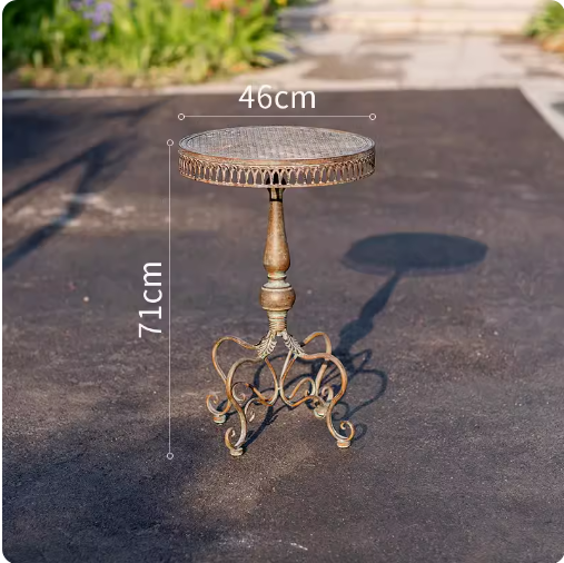 European Retro Iron Courtyard Table and Chairs, crafted from wrought iron, ideal for a cozy garden or terrace. This set is perfect for leisure and relaxation, creating a charming outdoor ambiance.