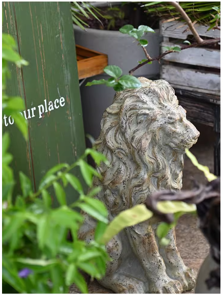 A large lion sculpture for the garden, evoking a sense of European vintage garden artistry.