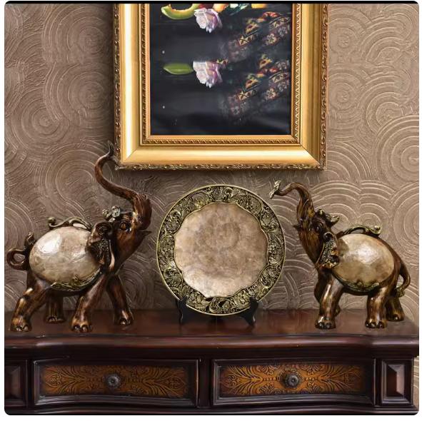 Combining classical Chinese, American luxury, and European styles, this set of three decorative elephant vases brings a touch of traditional elegance to any home. It's perfect for adding a touch of prosperity and charm to your living space.