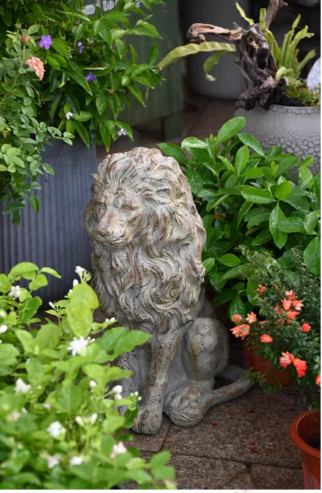 A large lion sculpture for the garden, evoking a sense of European vintage garden artistry.